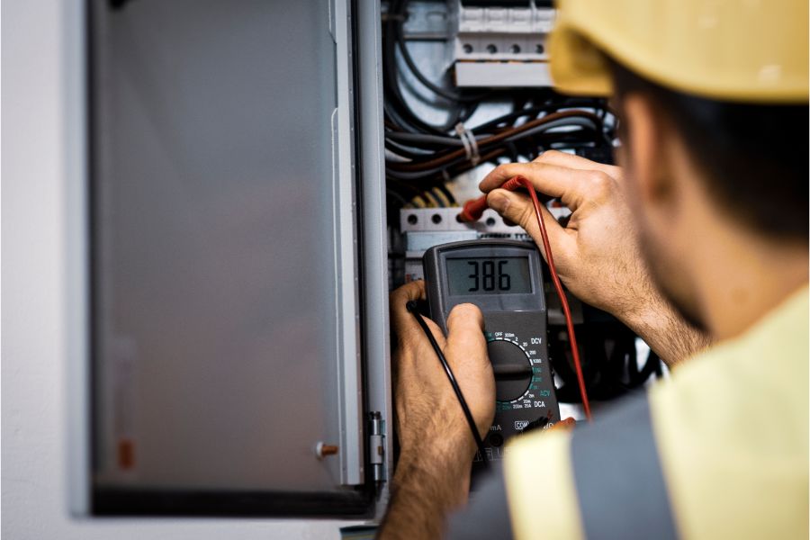 Electrian performing electrical repair