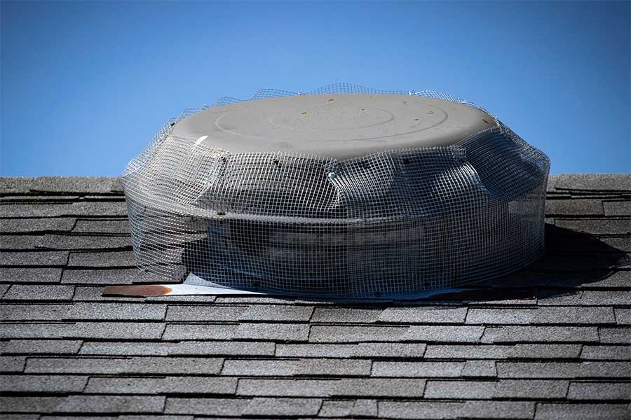 Attic fan installation underway