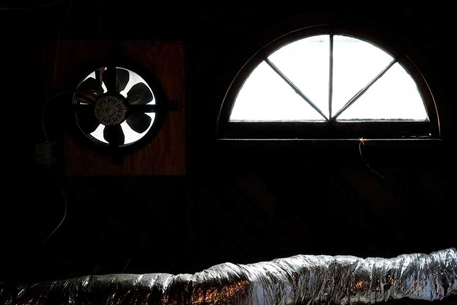 Attic fan installation in progress